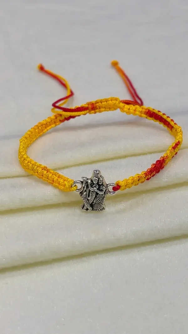 Yellow_Thread_Religious_Charm_Rakhi_for_Brother_-_Pack_of_2