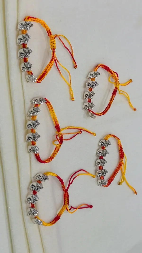 Red_Yellow_Thread_Elephant_Charm_Rakhi_Set_for_Brothers