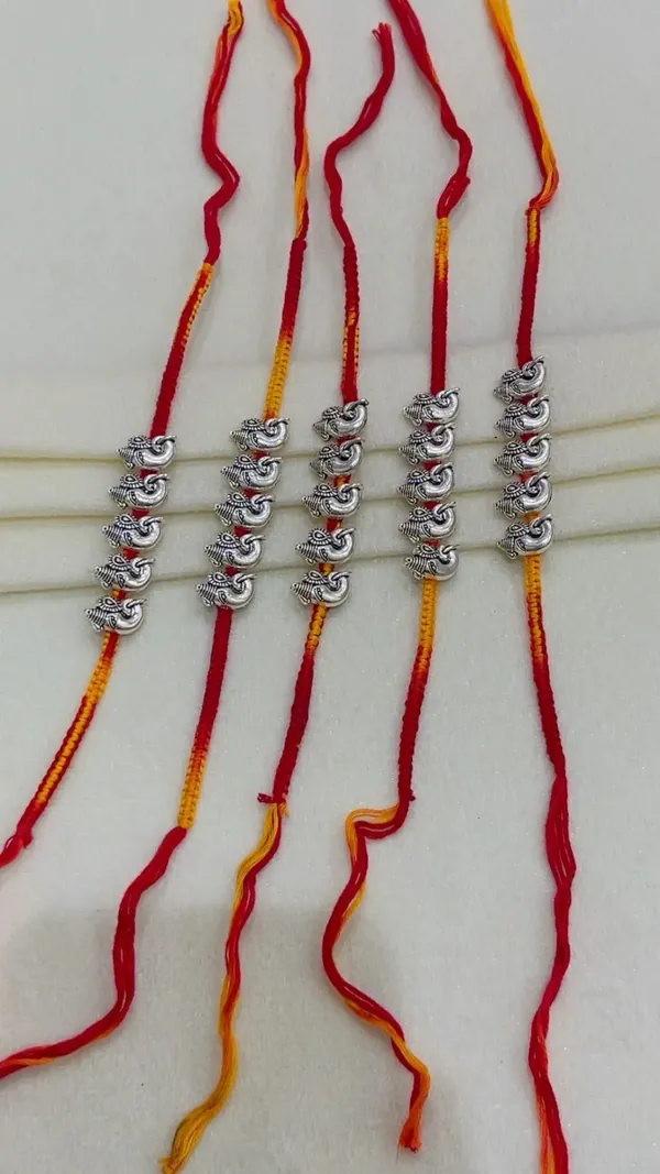 Red_Thread_Ganesha_Charm_Rakhi_for_Brother