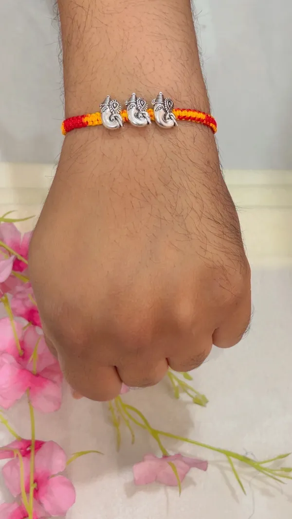 Red_Yellow_Thread_Elephant_Charm_Bracelet_for_Women_-_Pack_of_2