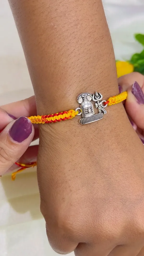 Red_Yellow_Braided_Thread_Rakhi_for_Brothers_-_Pack_of_2
