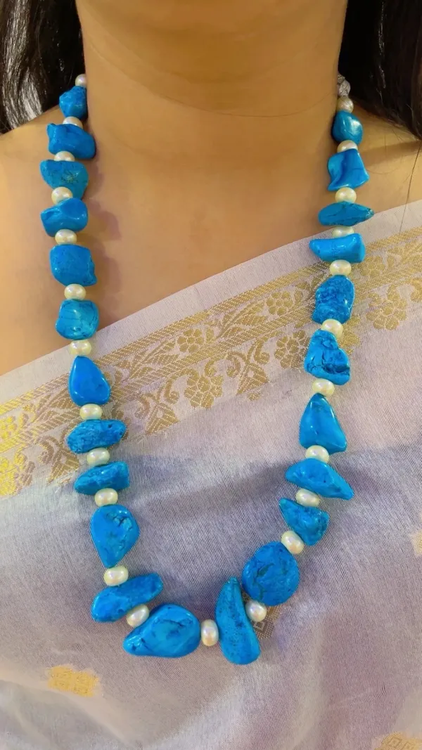 Blue_Beaded_Long_Necklace_With_White_Bead_Accents