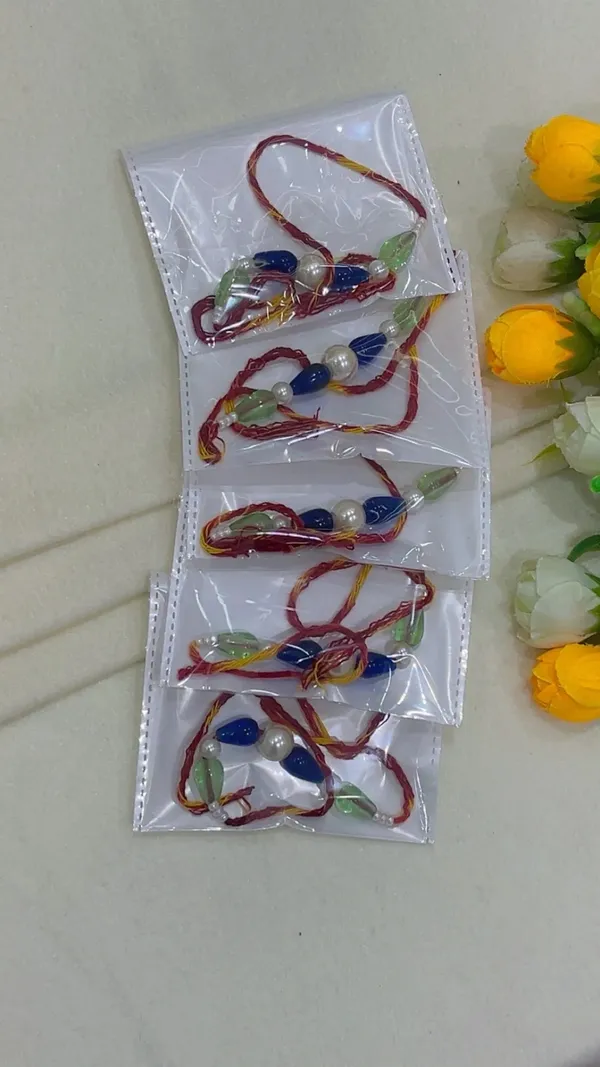 Red_Yellow_Thread_Beaded_Rakhi_Set_for_Brother