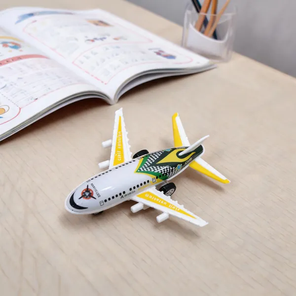 White_And_Yellow_Toy_Airplane_With_Wheels
