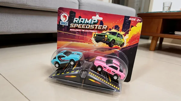 Blue_And_Pink_Toy_Cars_With_Racing_Ramp_Playset