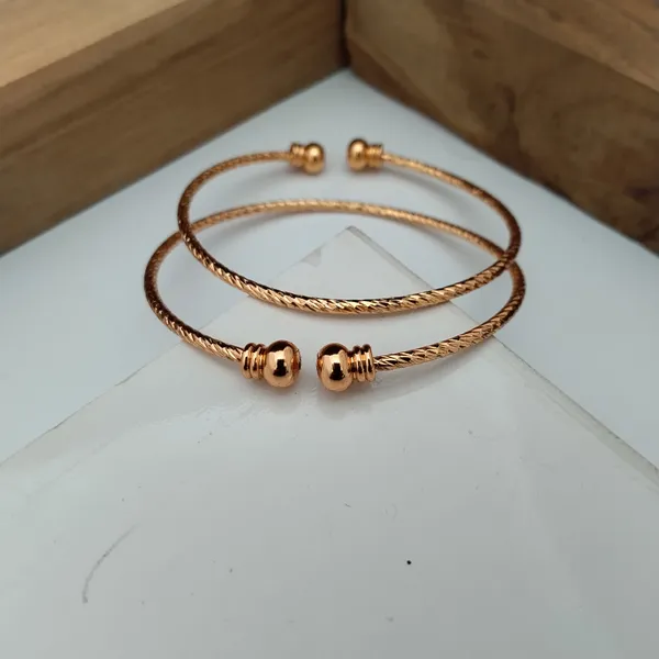 Gold_Toned_Twisted_Open_Cuff_Bracelet_For_Women