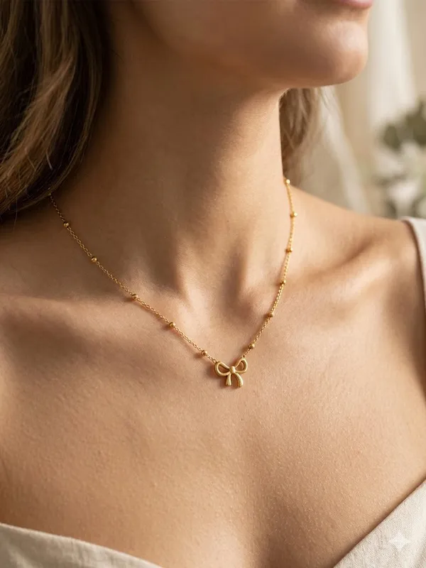 Gold_Stainless_Steel_Bow_Charm_Necklace_For_Women