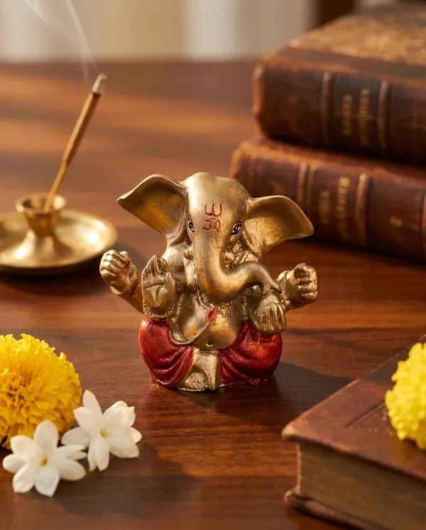 Golden_And_Red_Resin_Marble_Dust_Ganesha_Idol_Home