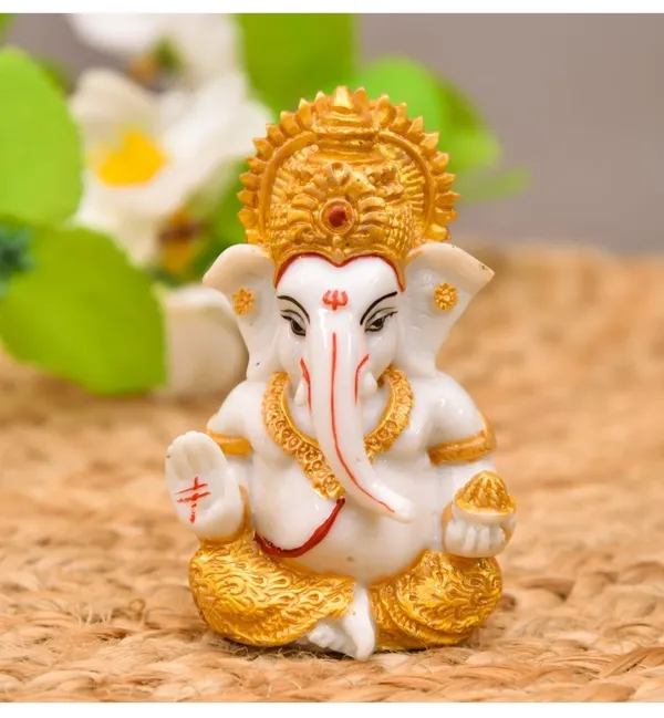 White_And_Golden_Resin_Marble_Dust_Ganesha_Idol_Home