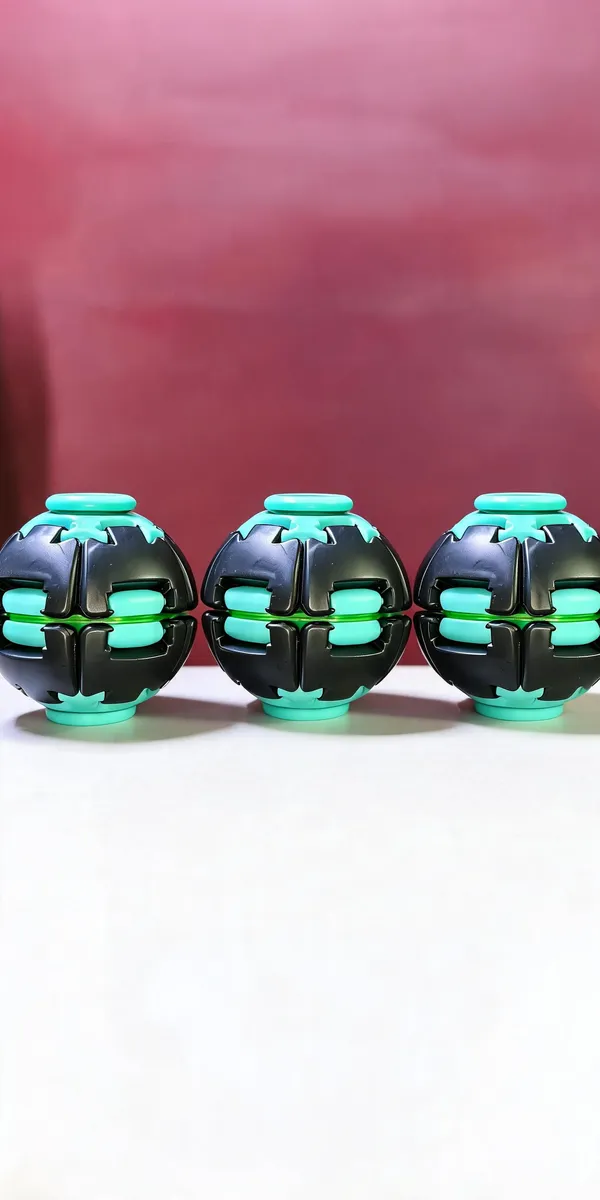 Black_And_Teal_Plastic_Spin_Ball_Toy_For_Kids_Pack_Of_3