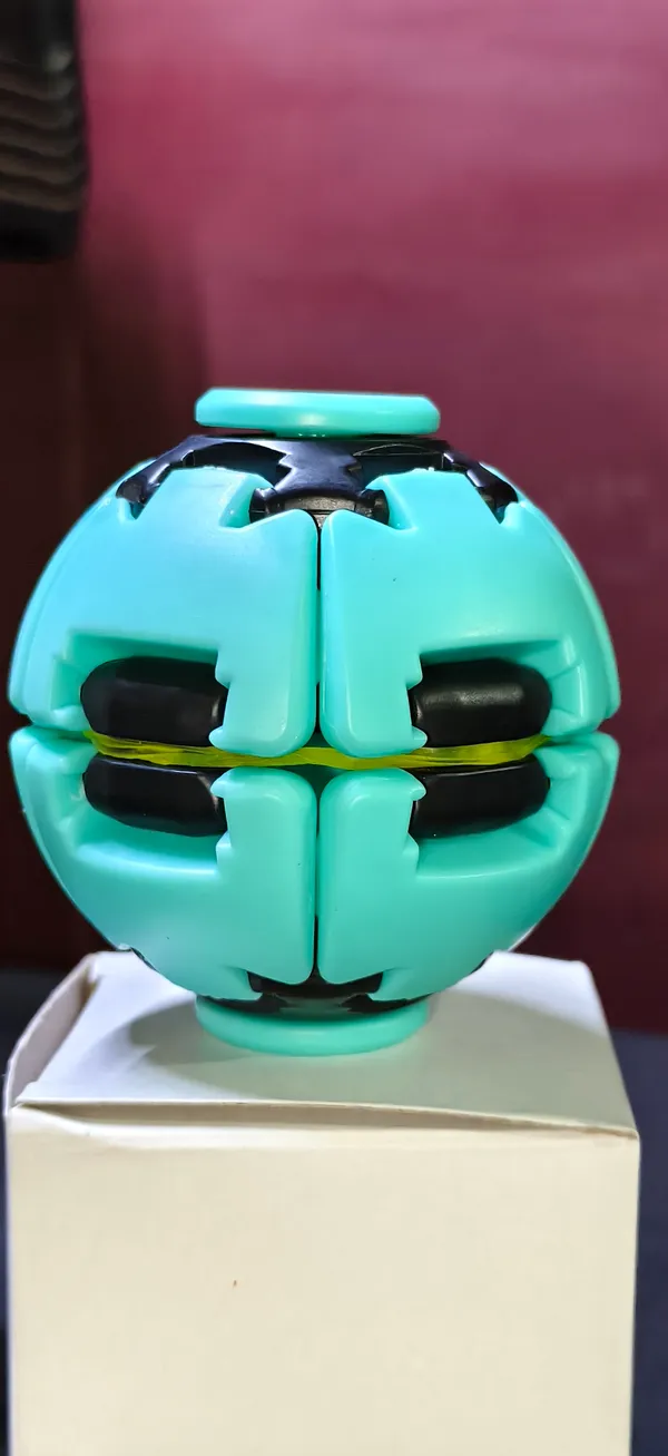 Turquoise_Plastic_Spin_Ball_Toy_For_Kids_Pack_Of_3