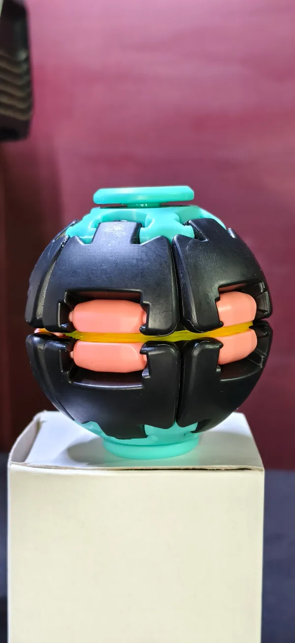 Black_And_Teal_Plastic_Spin_Ball_Toy_For_Kids_Pack_Of_3