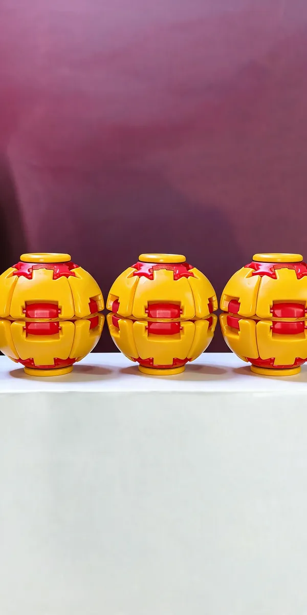 Red_And_Yellow_Plastic_Spin_Ball_Toy_For_Kids_Pack_Of_3