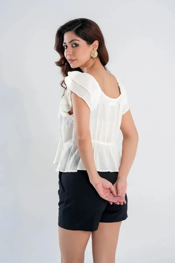 Off-White_Cotton_Ruffle_Sleeve_Peplum_Top