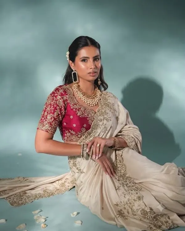 White_Pure_Soft_Rangoli_Silk_Saree_with_C-Pallu_Zari,_Sequin_&_Thread_Embroidery_Work_and_Maroon_Blouse