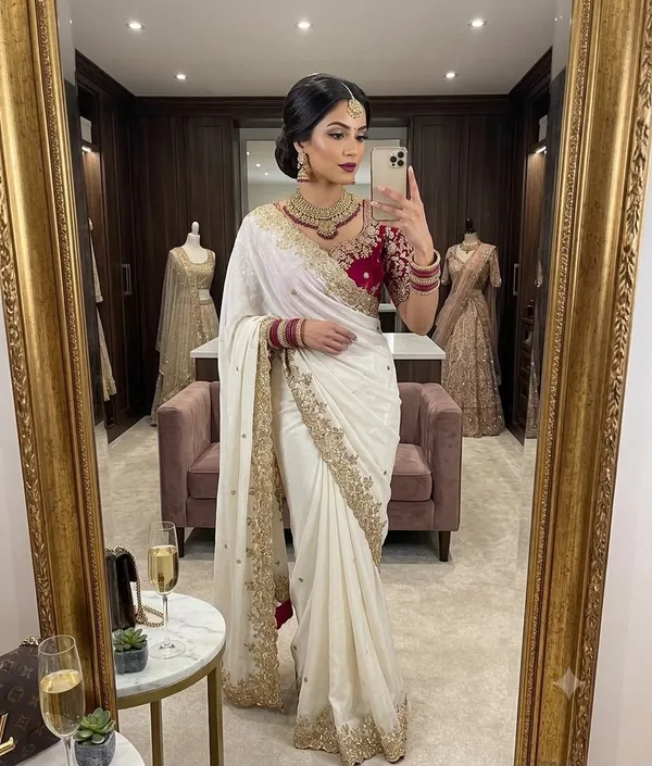 White_Pure_Soft_Rangoli_Silk_Saree_with_C-Pallu_Zari,_Sequin_&_Thread_Embroidery_Work_and_Maroon_Blouse