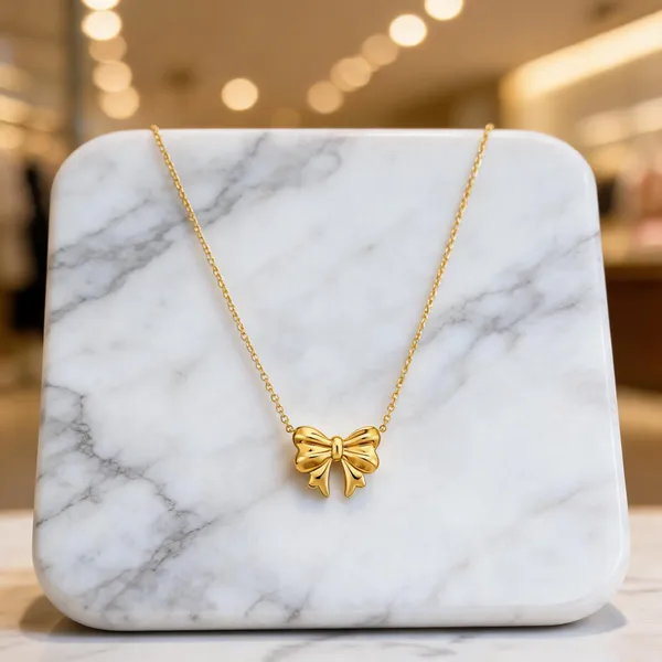 Gold_Stainless_Steel_Bow_Pendant_Necklace_For_Women