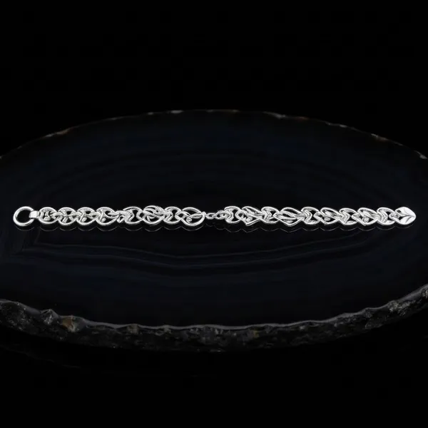 Silver_Floral_Oval_Motif_Link_Bracelet_For_Women