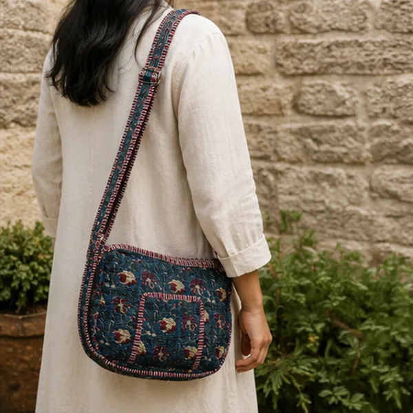 Neel_Gul_Quilted_Sling_Bag_Midnight_Blue_Cotton_Crossbody_With_Red_Mustard_Floral_Jaal_Front_Pocket_House_Of_Virasaat