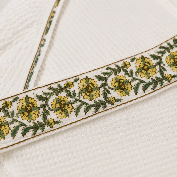 Peeli_Bagh_Waffle_Bathrobe_White_Cotton_Bath_Robe_With_Yellow_Marigold_Floral_Border_Sleeve_Buti_House_Of_Virasaat