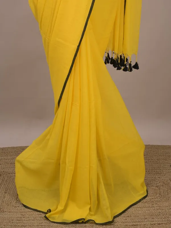 Yellow_Sheer_Saree_With_Tassel_Border_for_Women