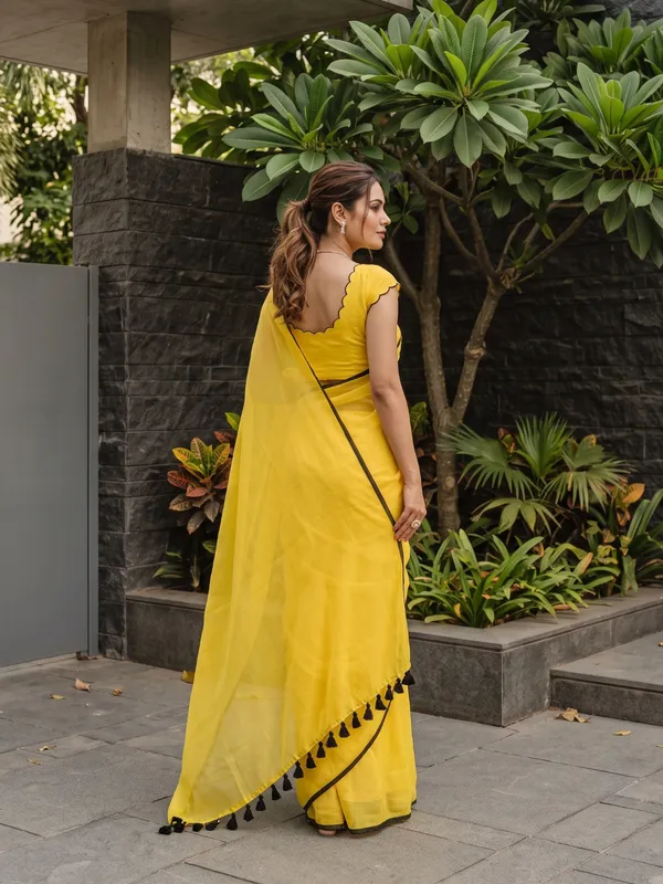 Yellow_Sheer_Saree_With_Tassel_Border_for_Women