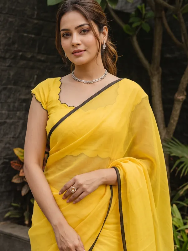 Yellow_Sheer_Saree_With_Tassel_Border_for_Women