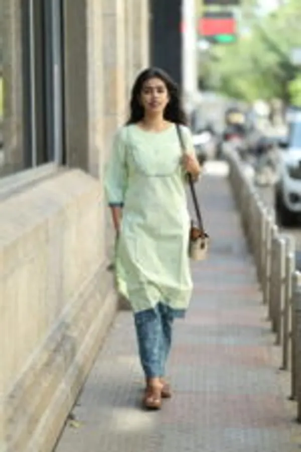 Pastel_Green_Pin_Tucked_Cotton_Kurti_With_Blue_Contrast_Pants_Elegant_Everyday_Wear