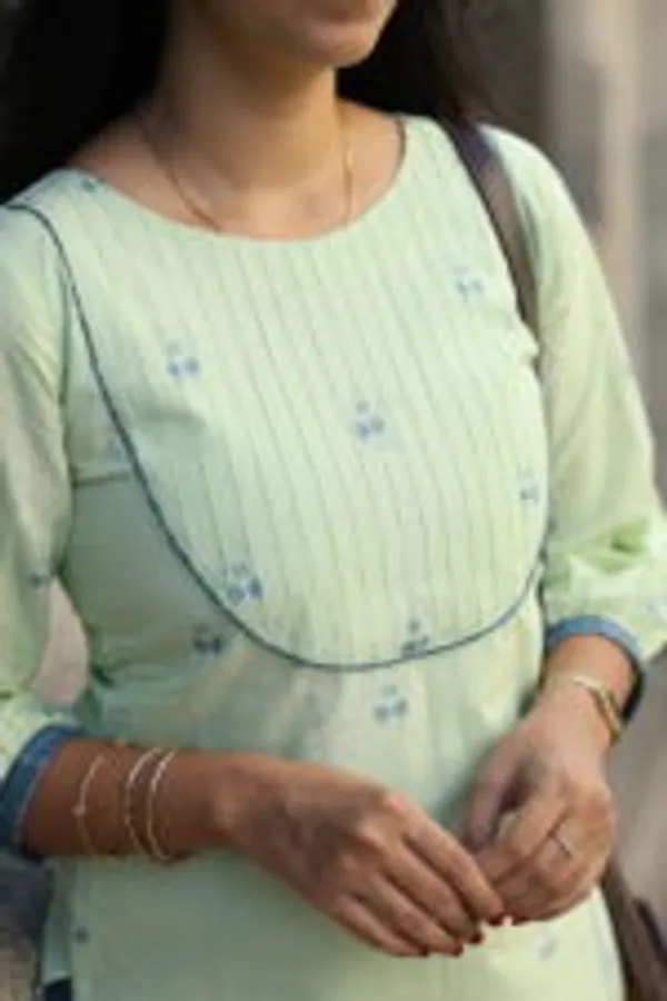 Pastel_Green_Pin_Tucked_Cotton_Kurti_With_Blue_Contrast_Pants_Elegant_Everyday_Wear