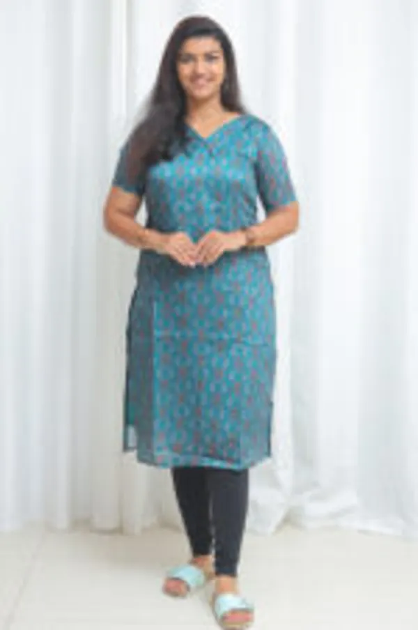 Teal_Whisper_Silk_Organza_Kurti_With_Ikat_Charm