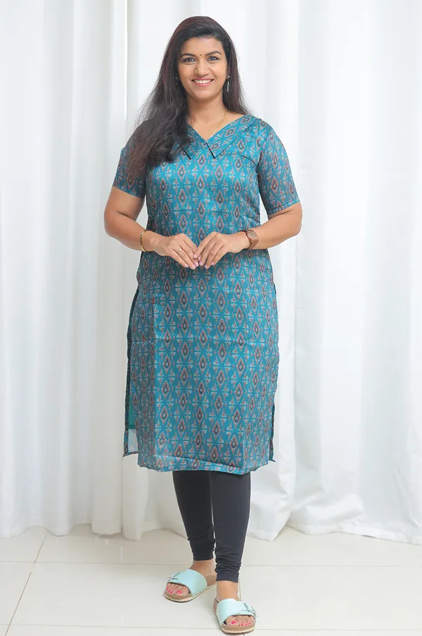 Teal_Whisper_Silk_Organza_Kurti_With_Ikat_Charm