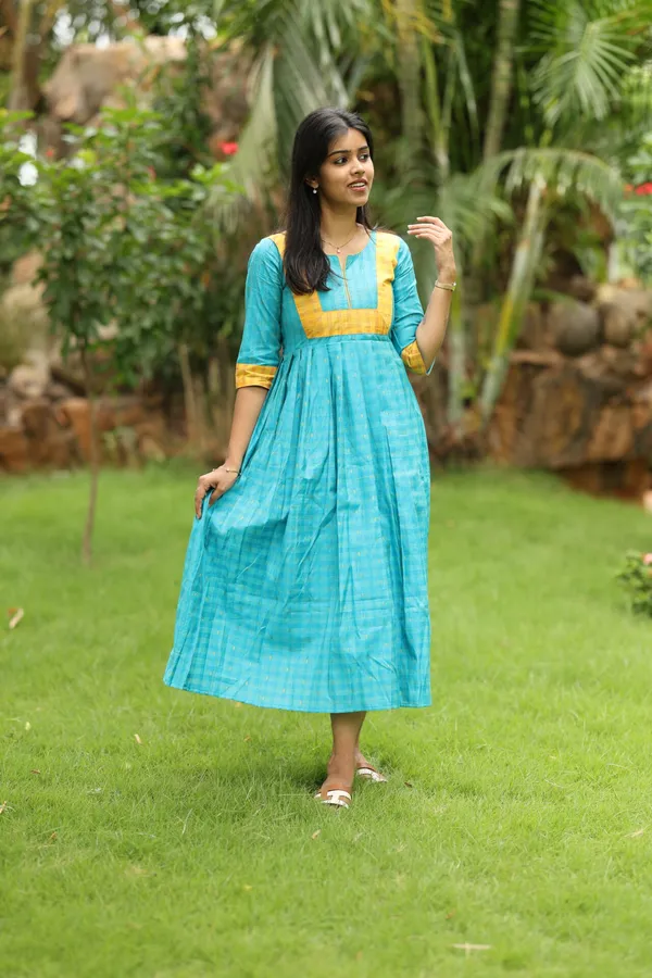 Teal_Blue_Silk_Maxi_Frock_With_Mustard_Border_Elegant_Festive_Wear