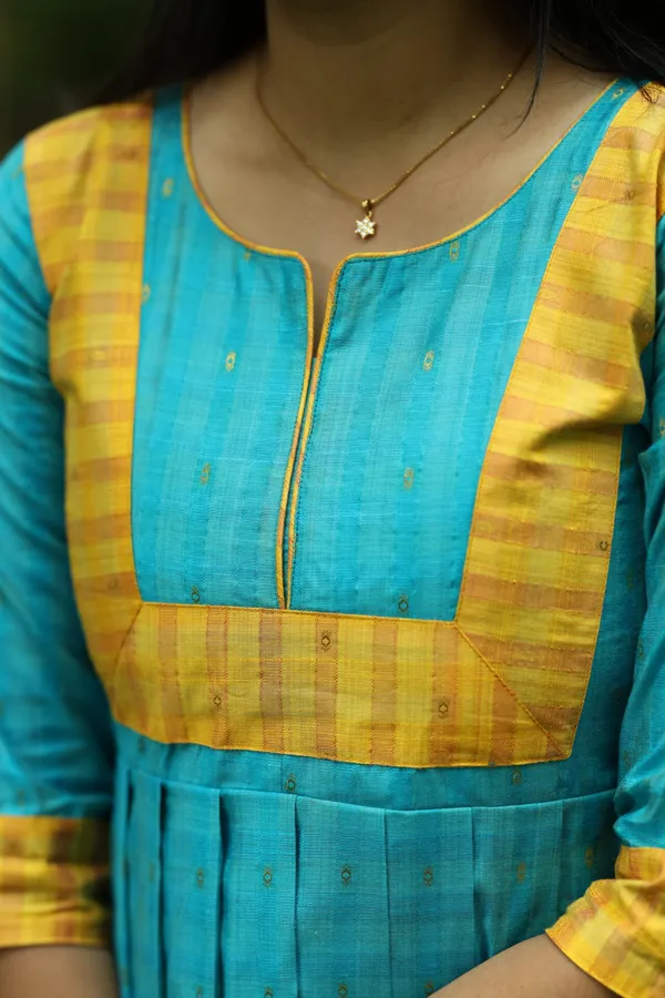 Teal_Blue_Silk_Maxi_Frock_With_Mustard_Border_Elegant_Festive_Wear