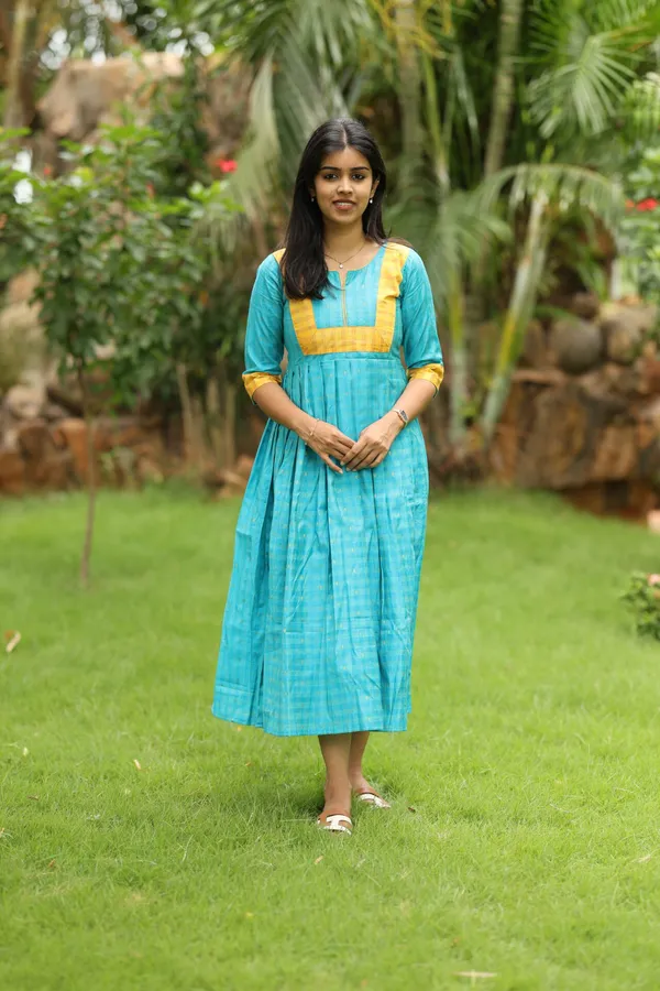 Teal_Blue_Silk_Maxi_Frock_With_Mustard_Border_Elegant_Festive_Wear