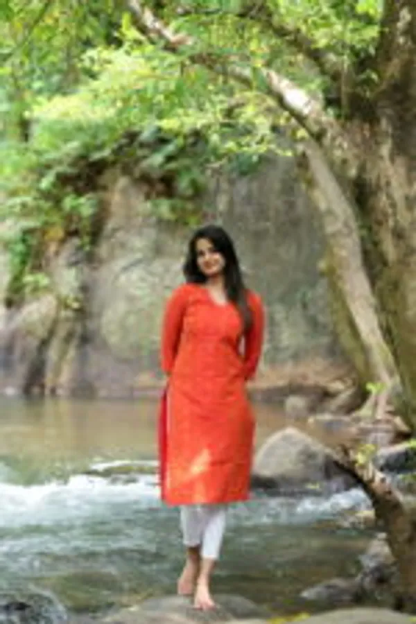 Orange_Silk_Kurti_With_Minimal_Woven_Motifs_Elegant_Festive_Wear