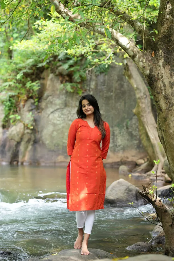 Orange_Silk_Kurti_With_Minimal_Woven_Motifs_Elegant_Festive_Wear