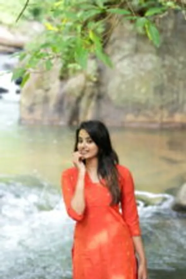 Orange_Silk_Kurti_With_Minimal_Woven_Motifs_Elegant_Festive_Wear
