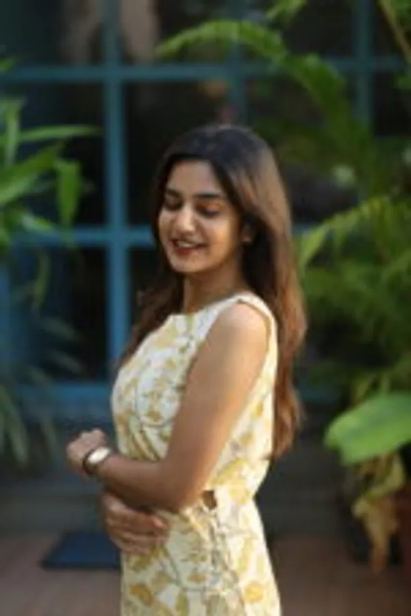 Yellow_Floral_Printed_Cotton_Sleeveless_Kurti_Top_With_Matching_Pants_Chic_Everyday_Wear