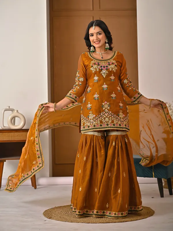 Yellow_Heavy_Fancy_Silk_Kurti_Sharara_Set_For_Women