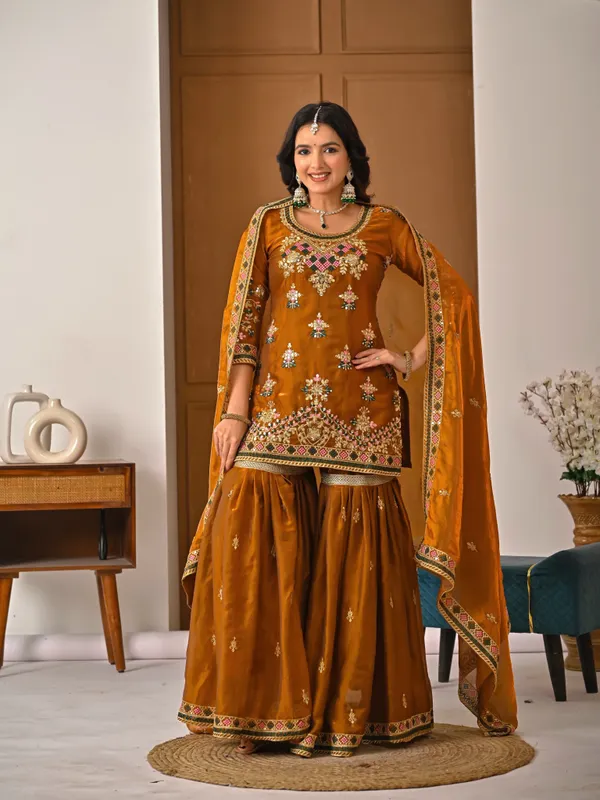 Yellow_Heavy_Fancy_Silk_Kurti_Sharara_Set_For_Women