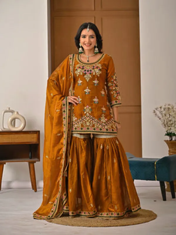 Yellow_Heavy_Fancy_Silk_Kurti_Sharara_Set_For_Women