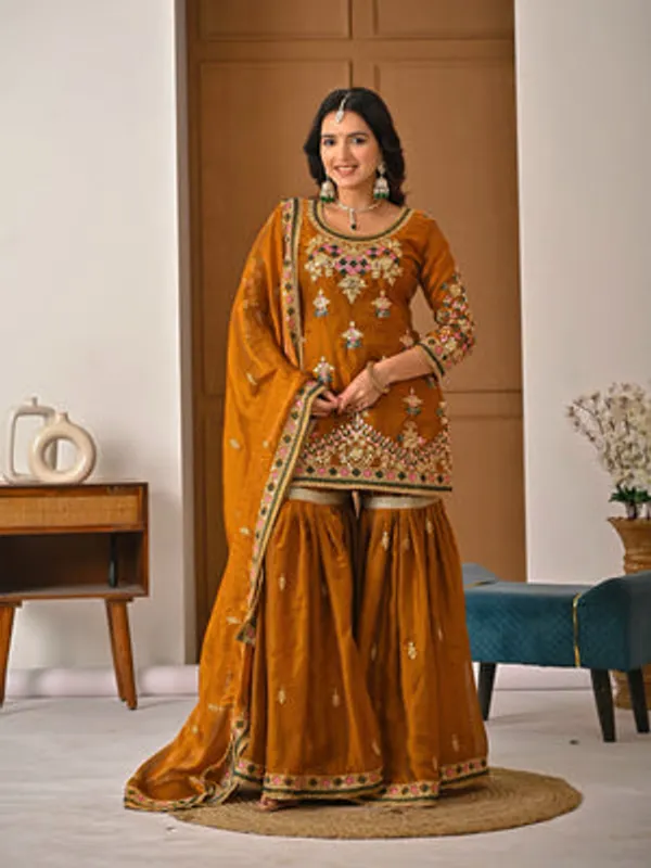 Yellow_Heavy_Fancy_Silk_Kurti_Sharara_Set_For_Women