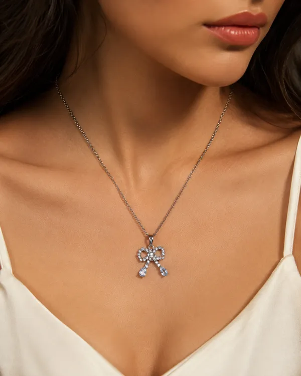Silver_Brass_Cubic_Zirconia_Bow_Ribbon_Gleam_Pendant_For_Women