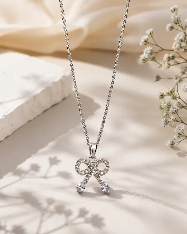 Silver_Brass_Cubic_Zirconia_Bow_Ribbon_Gleam_Pendant_For_Women
