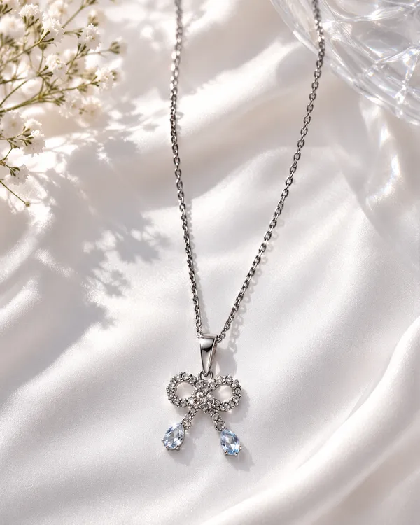 Silver_Brass_Cubic_Zirconia_Bow_Ribbon_Gleam_Pendant_For_Women
