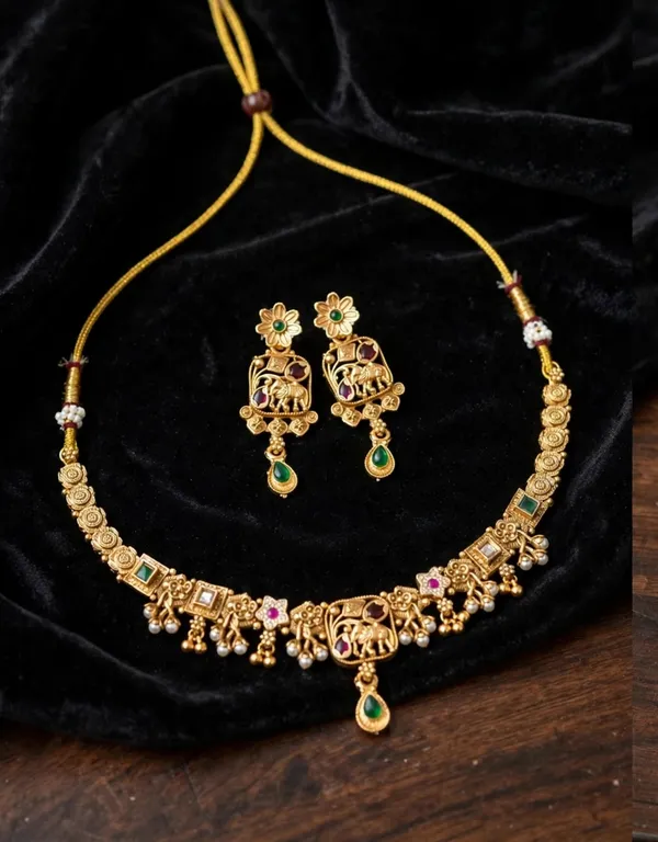 Gold_Brass_Temple_Elephant_Motif_Necklace_And_Earrings_Set_For_Women