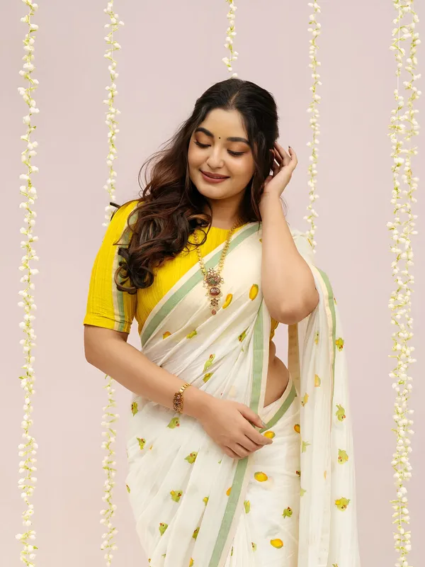 Elegant_Off_White_Linen_Cotton_Saree_With_Parrot_Motif_Pastel_Green_Border