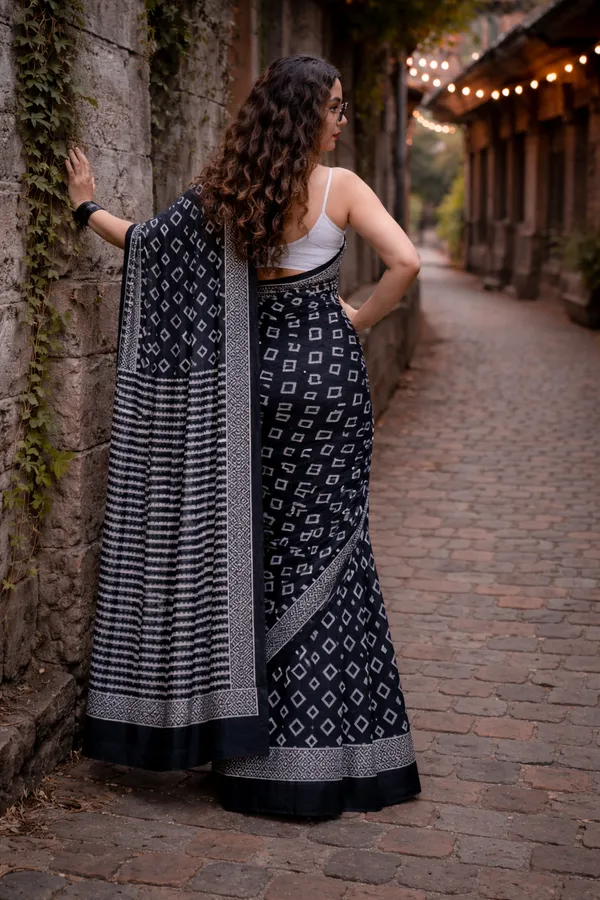Midnight_Noir_Linen_Cotton_Saree_With_Geometric_Print_Tribal_Border