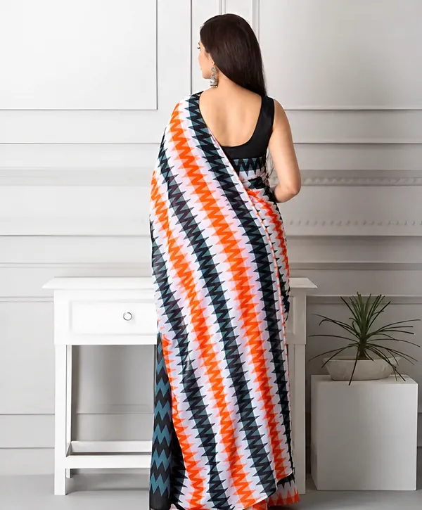 Bold_Geometric_Printed_Saree_Black_White_Orange_Statement_Drape