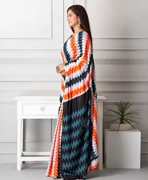 Bold_Geometric_Printed_Saree_Black_White_Orange_Statement_Drape